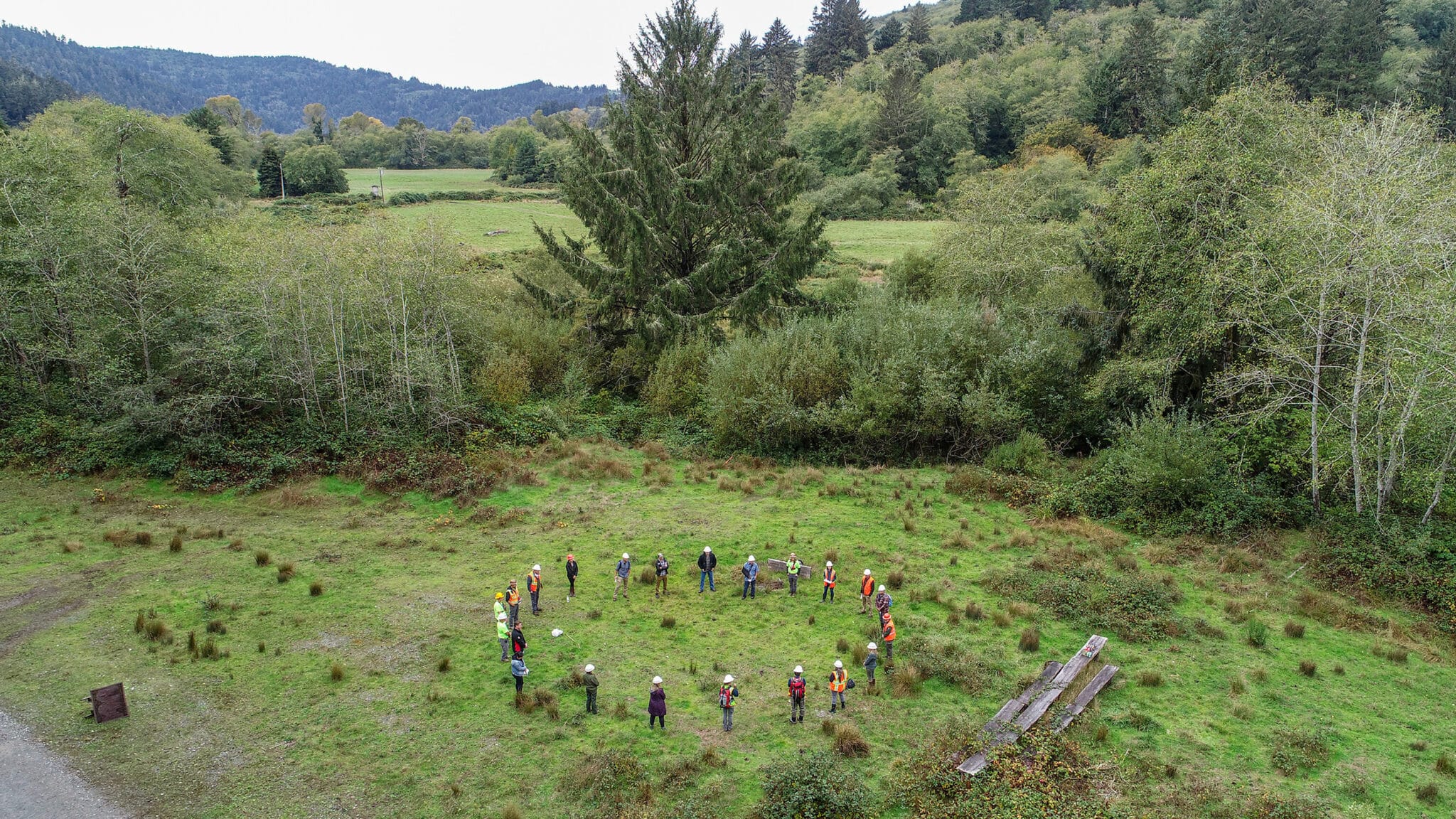 A group of people standing in a circle