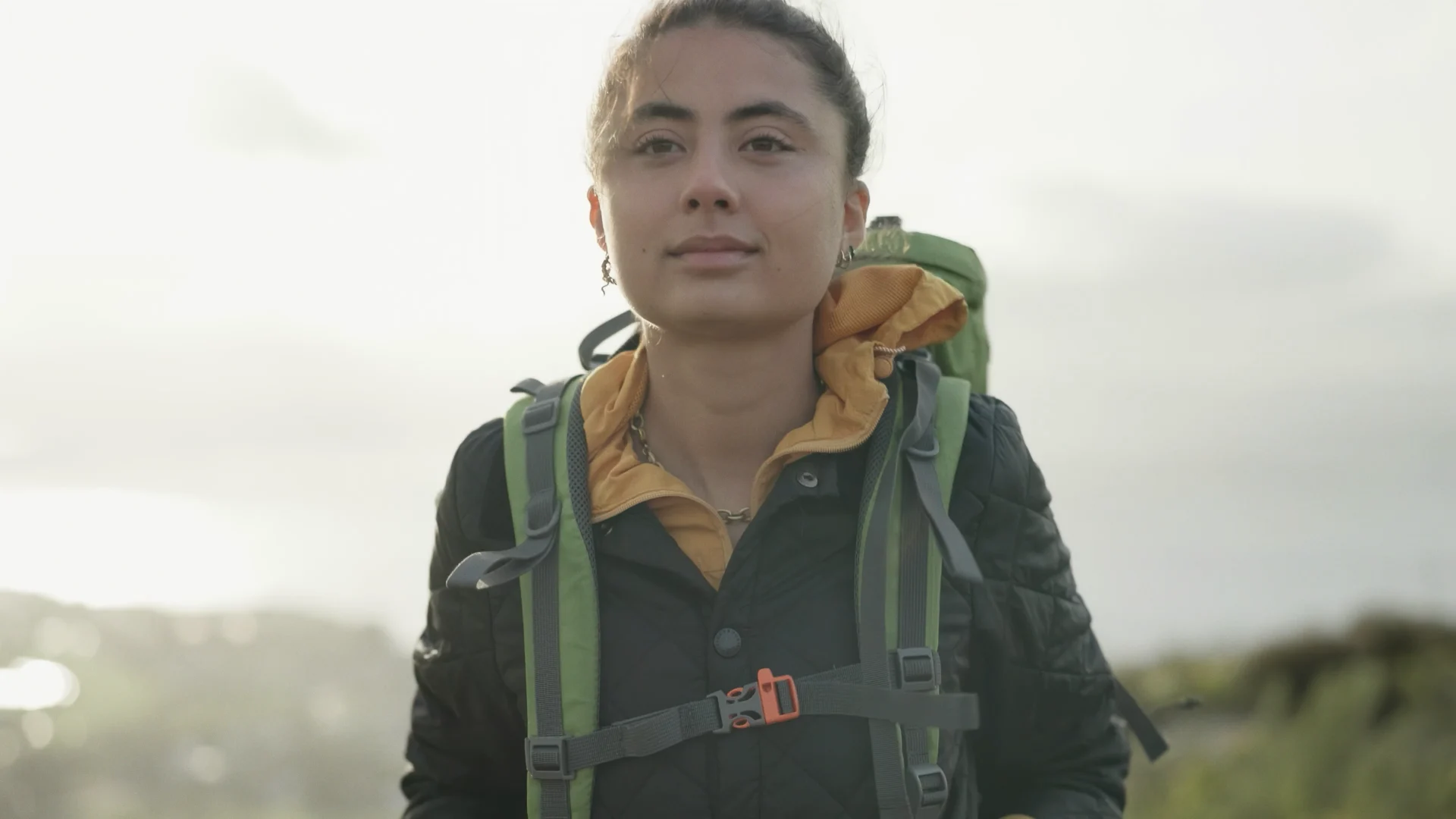 girl hiking with backpack