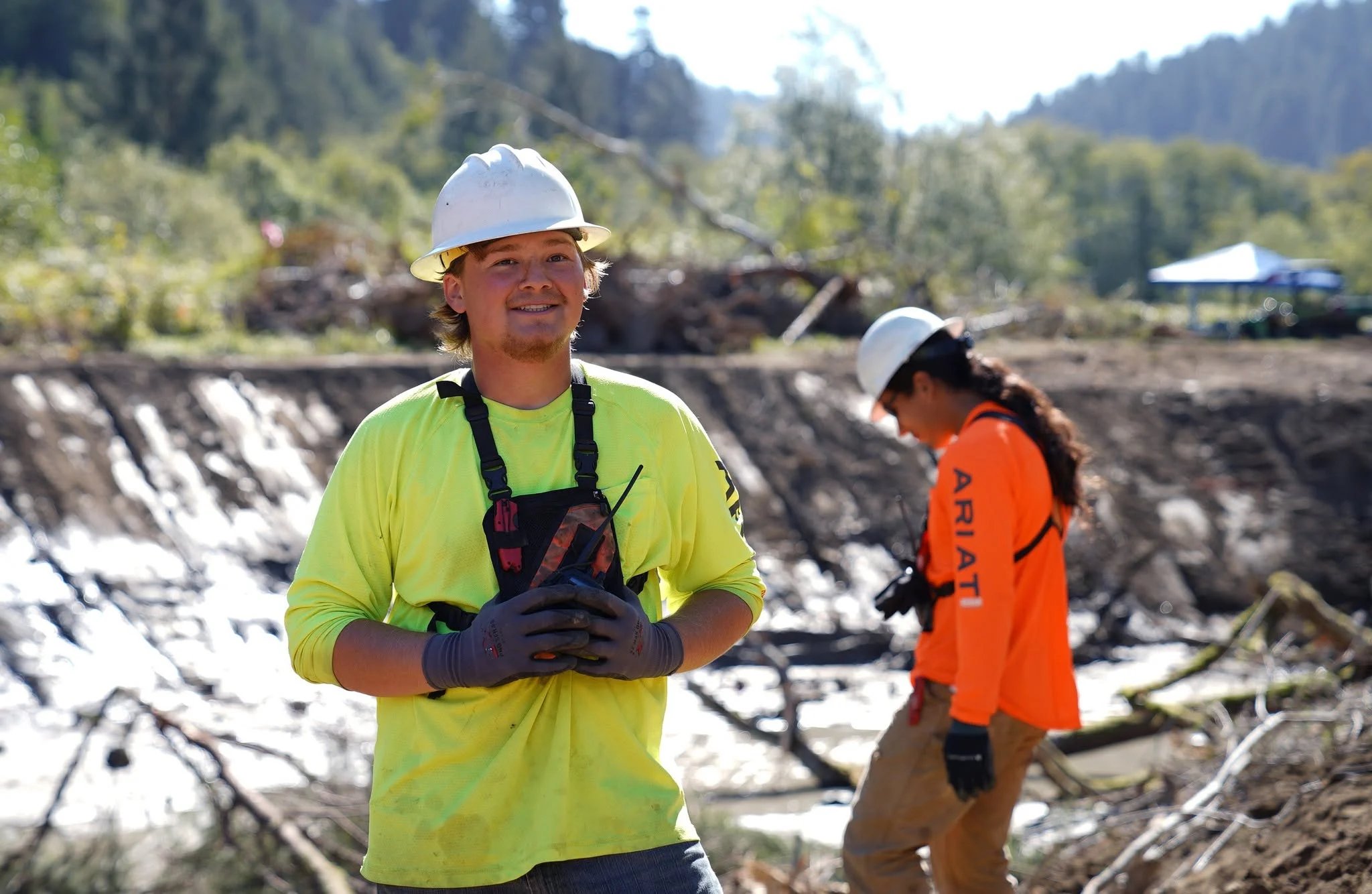 a pair of construction crew workers on the restoration site
