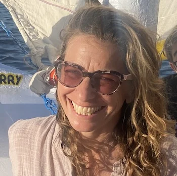 Woman smiling on sailboat